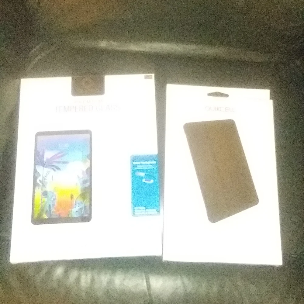 Tablet cases and tempered glass for a LG G Pad 5, all black.